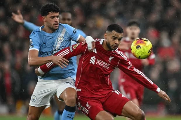 Man City shock Liverpool at Anfield as Haaland’s late penalty reignites title race